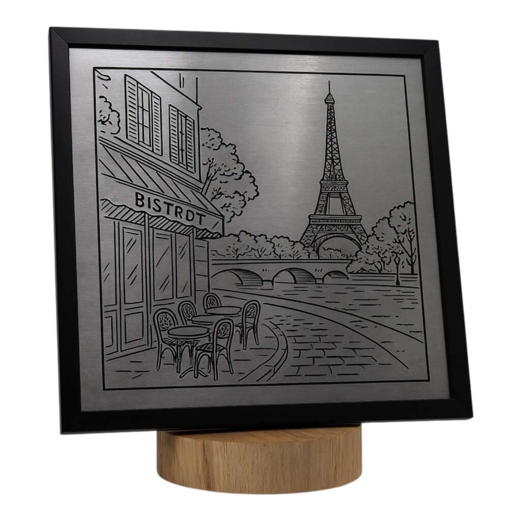 Metal engraving of a Paris bistrot scene with Eiffel Tower and bridge, mounted on a wooden base.